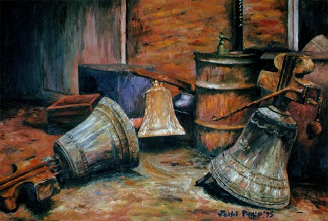 Still life of some drums and old church bells.